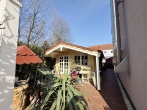 Reihenendhaus mit Kamin, Garten & viel Wohnkomfort - großes Gartenholzhaus