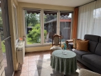 Bungalow mit besonderem Charme und idyllischem Garten in zentrumsnaher Lage - Heller Wintergarten