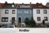 Sanierungsbedürftiges Reihenmittelhaus mit zwei Wohneinheiten in Bremen-Hemelingen - Straßenansicht